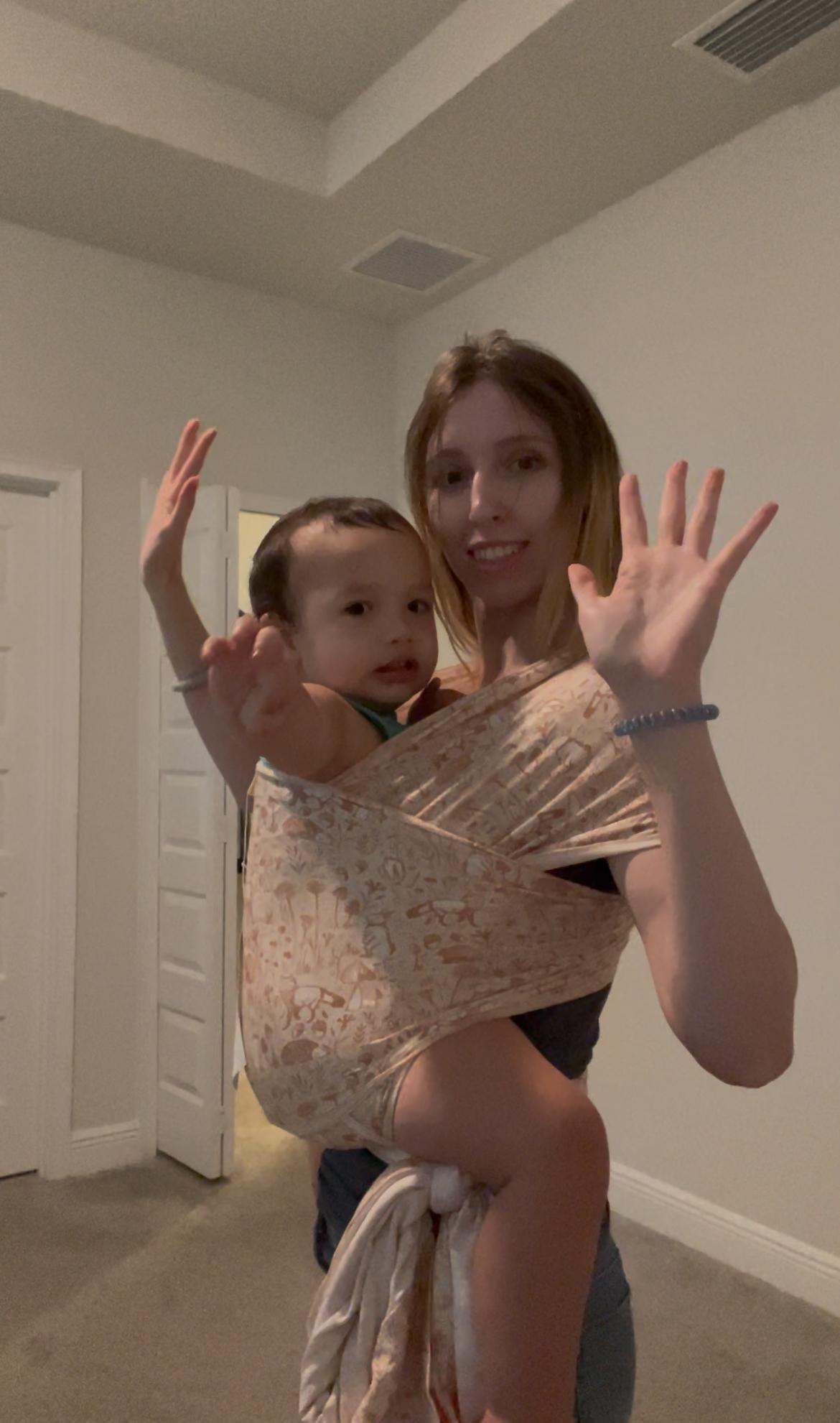 Shelby Luong wearing the Woodland Baby Wrap