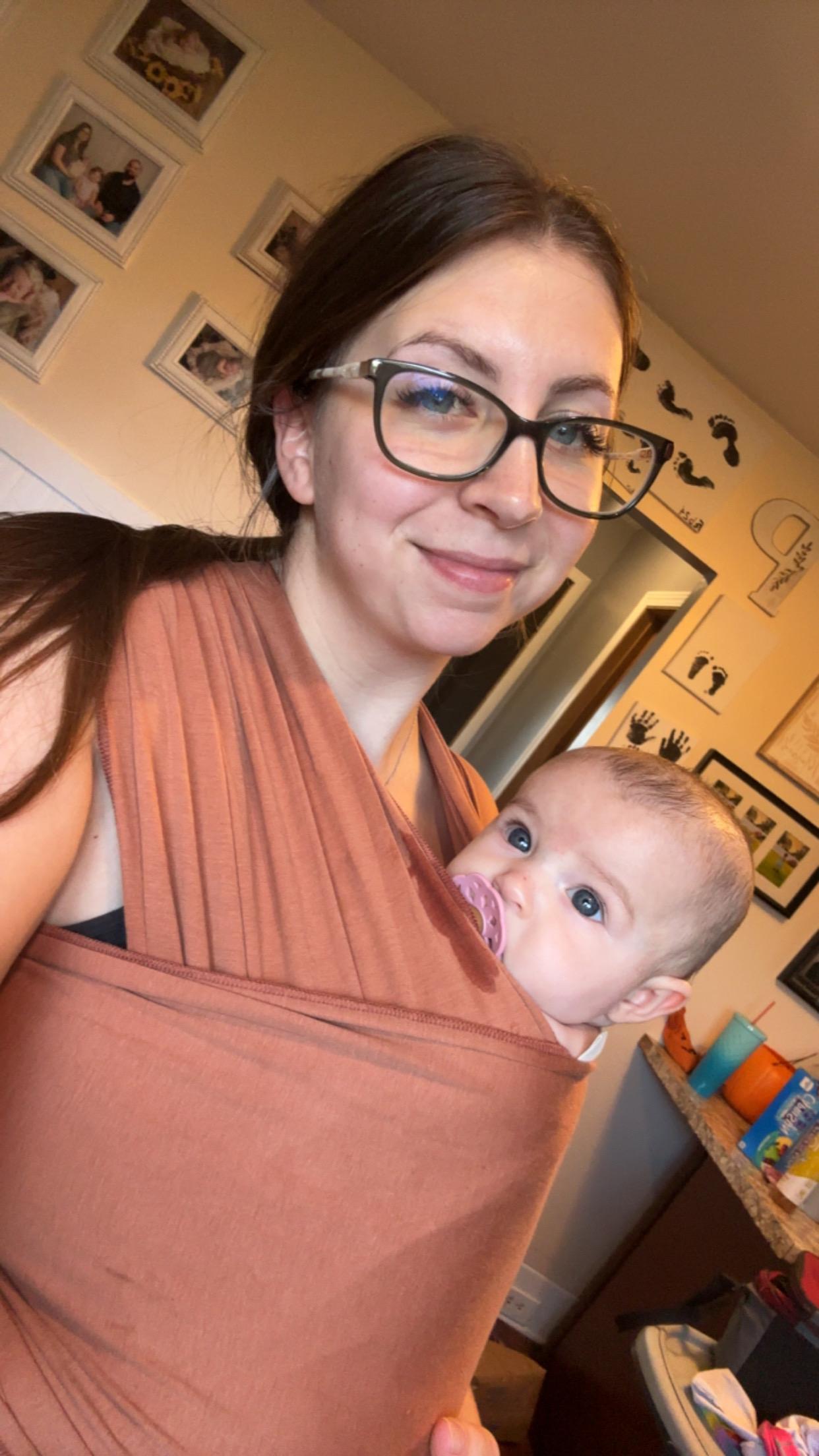 Jordan A. wearing the Sierra Baby Wrap